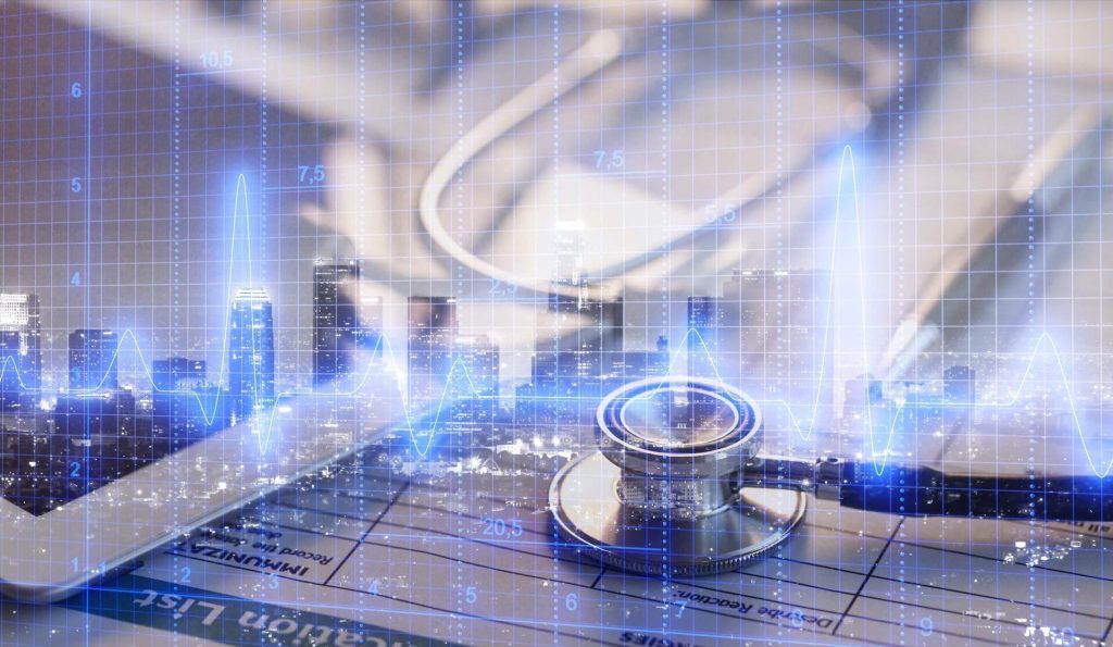 A stethoscope on a clipboard with a digital tablet and an overlaid blue ECG line in front of a city skyline.