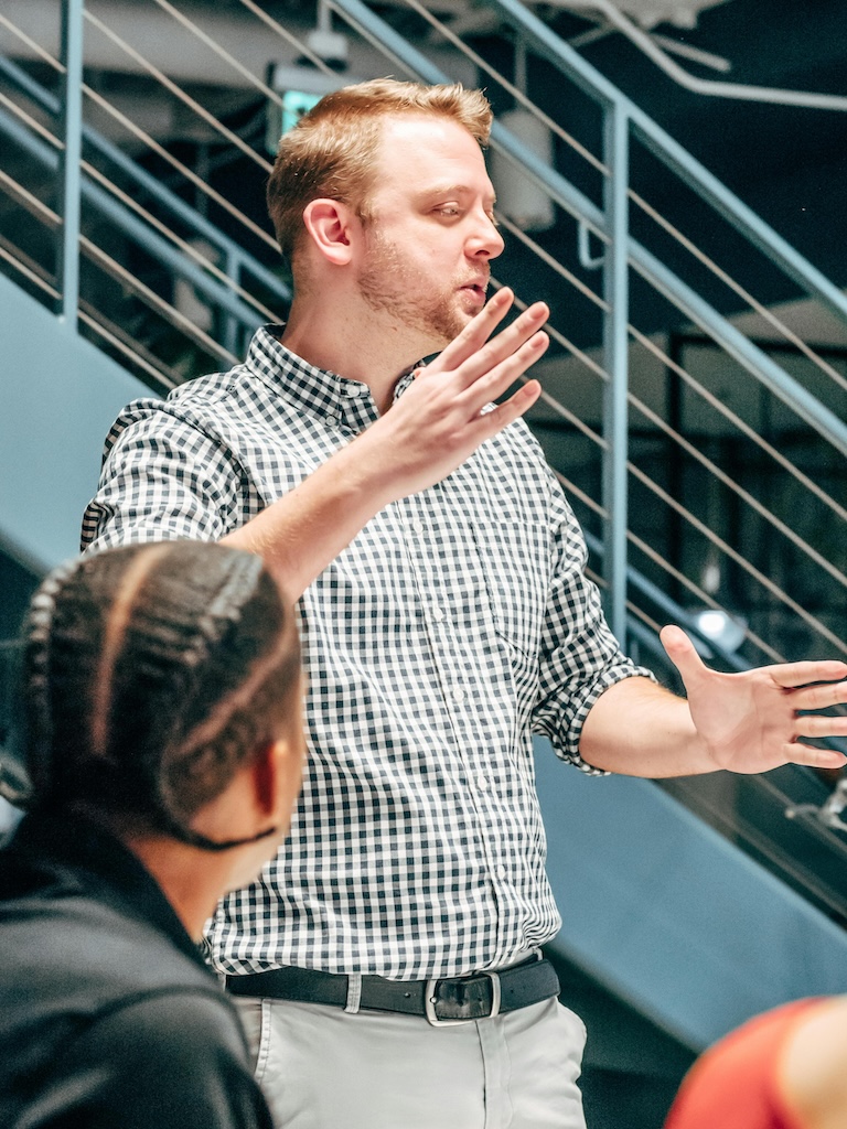A manager explaining a concept to his team.