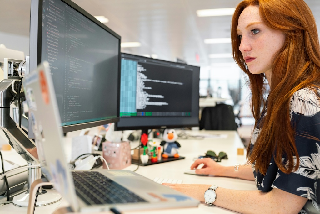 Lady working on source code.