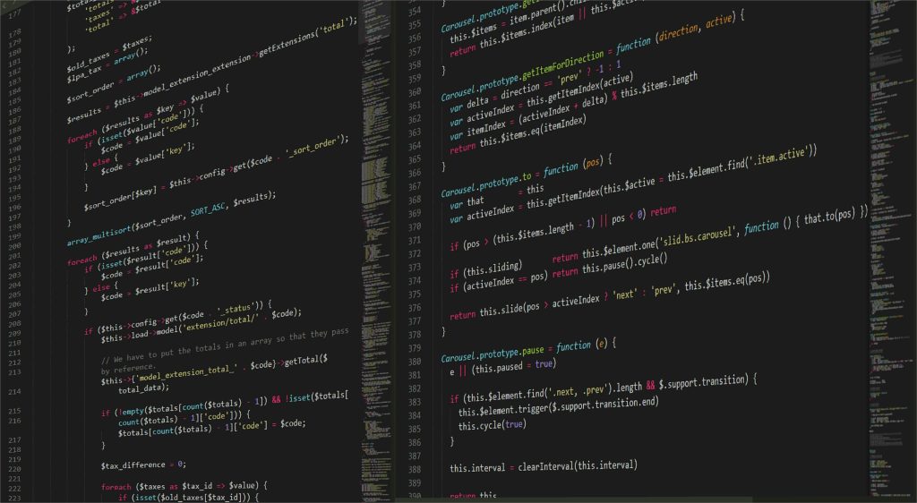 Image of a large screen displaying code