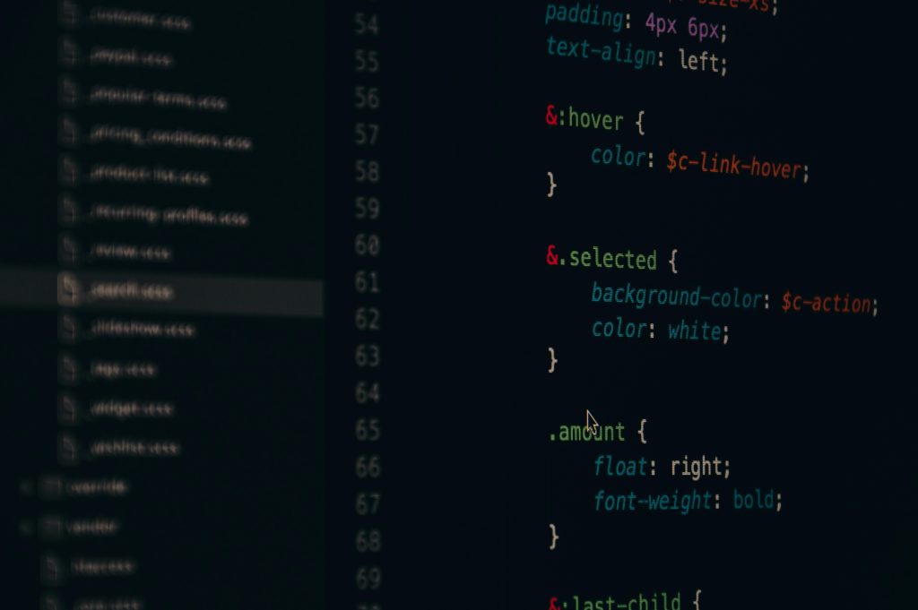Black screen displaying colorful source code