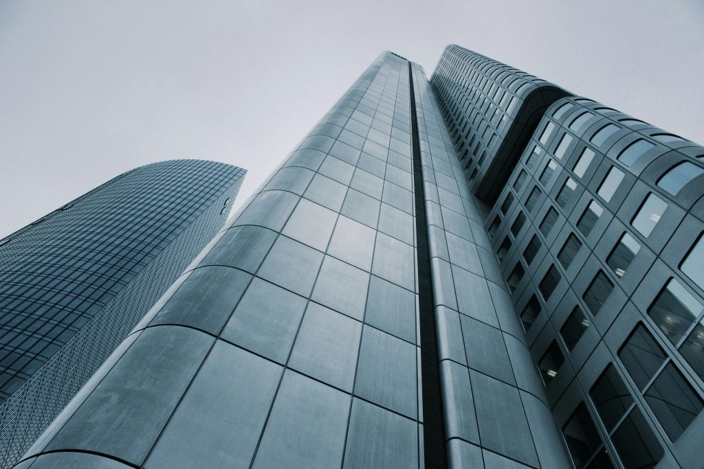 Image of a tall grey modern office building